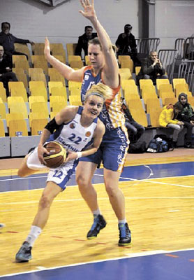 Tsmoki-Minsk forward Yulia Gaponova (in the background) in action